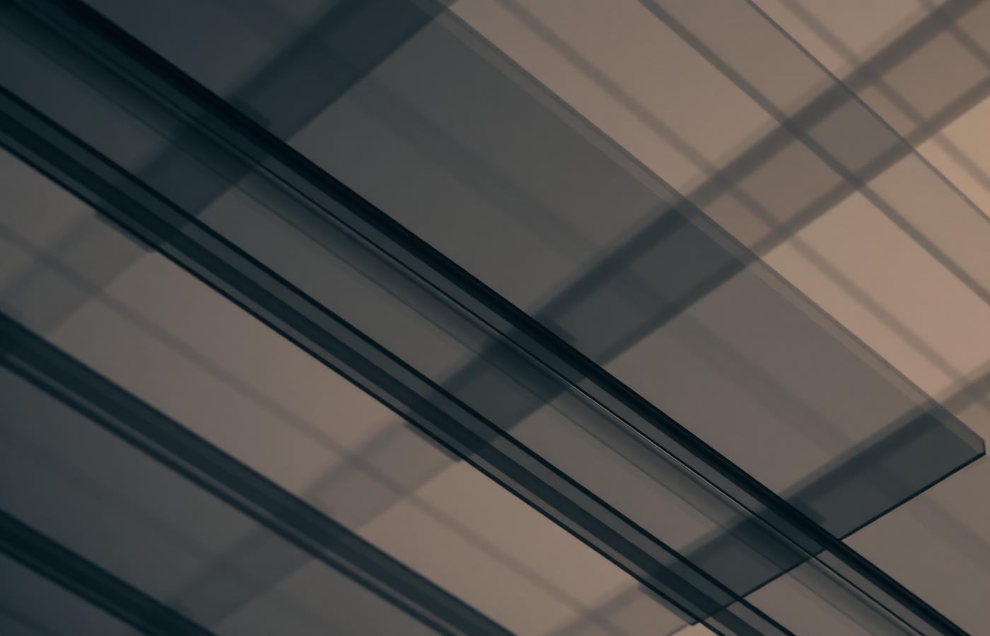 Layered translucent glass panels evoking cloud infrastructure architecture
